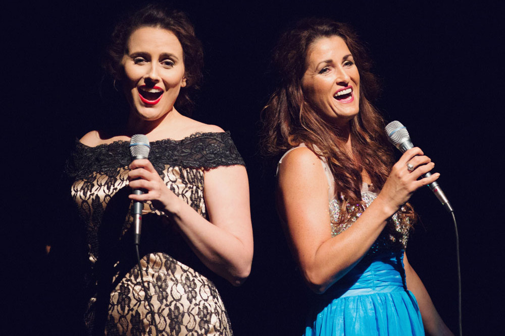 Lizzie Moore (left) as Patsy Cline and Amber Joy Poulton as Loretta Lynn in ‘Coal Miner’s Daughter’ coming to Cairns and Innisfail this October. Picture: Supplied