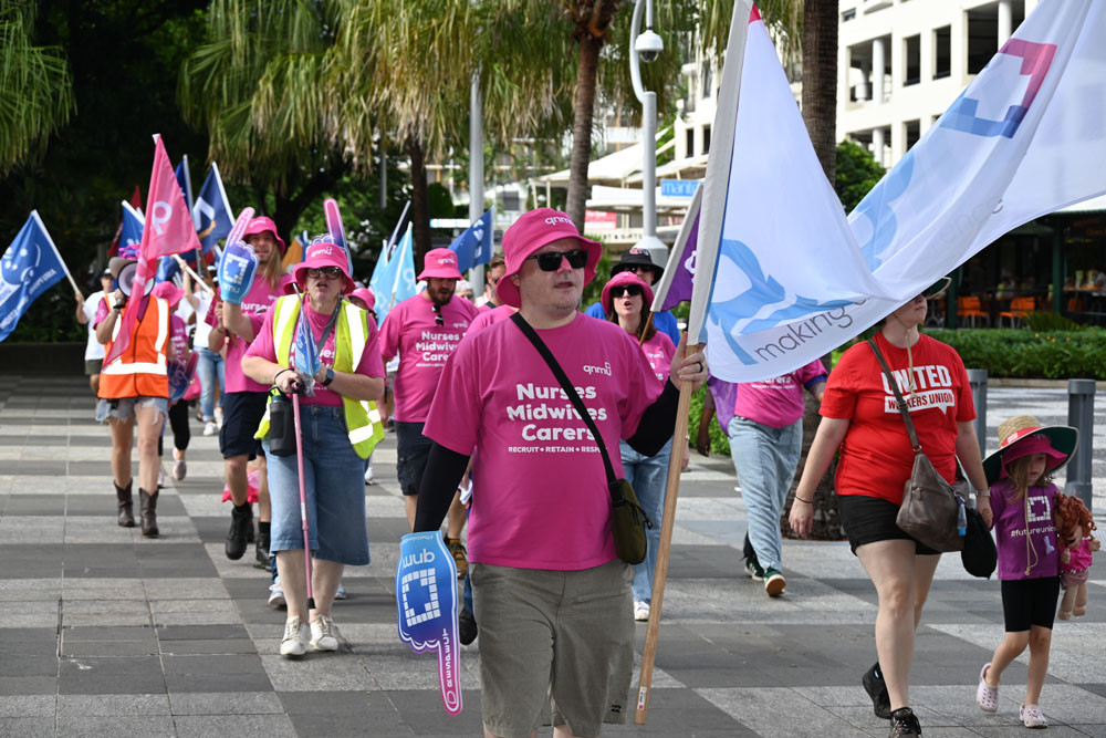 Union members march along the Cairns Esplanade during Monday’s Labour Day parade. Pictures: Isabella Guzman Gonzalez