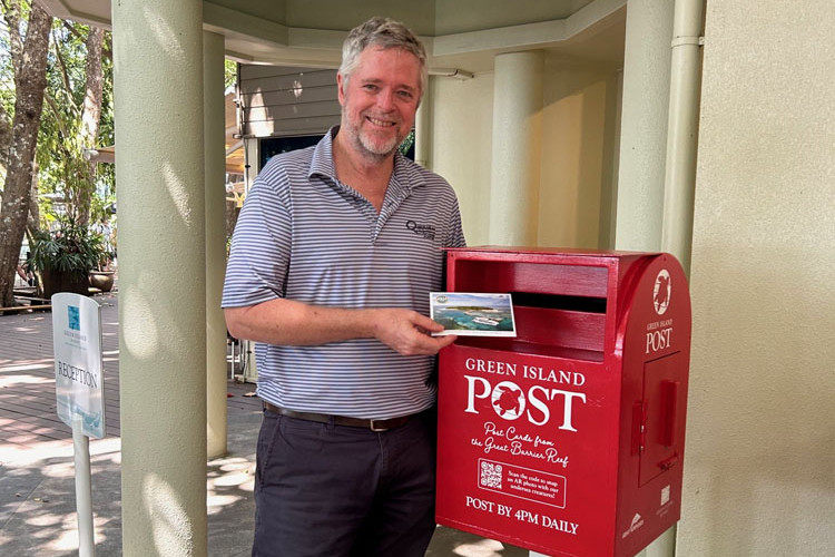 Quicksilver Group boss Tony Baker posts a postcard on Green Island. Picture: Supplied
