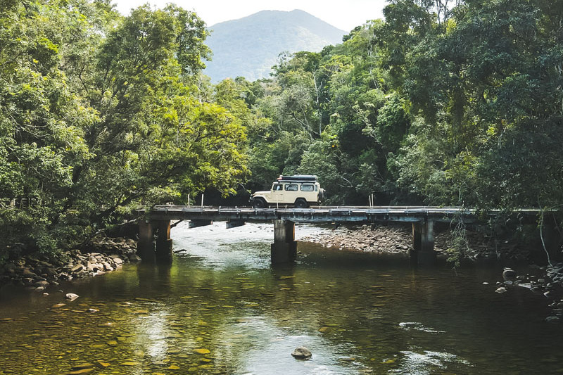 A Toyota Land Cruiser crosses a bridge on the road to Cape Tribulation. Pictures: Tourism Tropical North Queensland