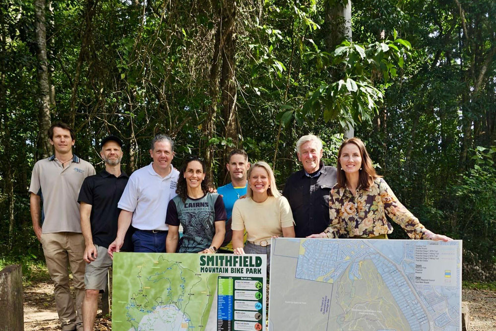 At the mountain bike park expansion launch were (from left) Toby Porter of Queensland Parks and Wildlife, Crankworx Cairns event director Nathan Bassett, Tourism Tropical North Queensland chief executive Mark Olsen, Cairns Mountain Bike Club president Rachael White, mountain biking legend ‘Sik Mik’ Mick Hannah, Member for Barron River Bree James, World Trail founder Glen Jacobs and Mayor Amy Eden. Picture: Supplied