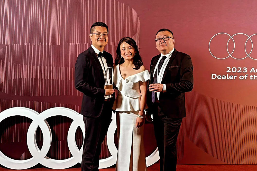 Alan Ren, Connie Kang and Felix Wong of Audi Centre Cairns with their national Audi awards. Picture: Supplied