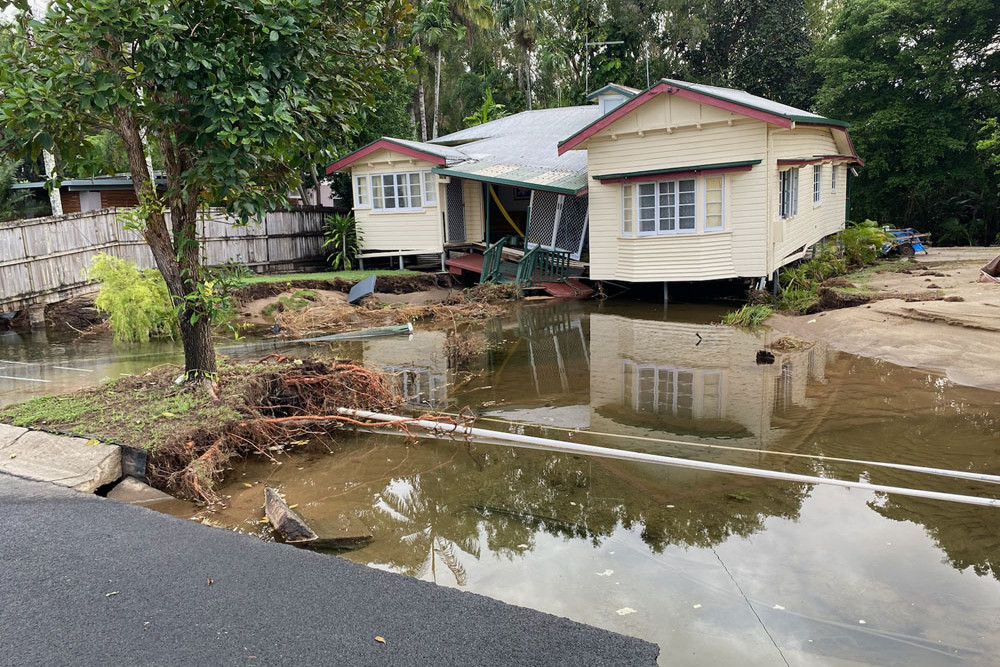 This house on Oleander St, Holloways Beach, was largely destroyed in the Cyclone Jasper floods.