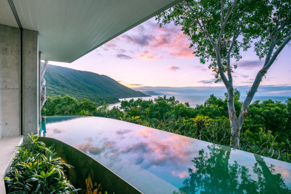 Stunning views of the coastline are breathtaking features of this Palm Cove home. Pictures: Supplied