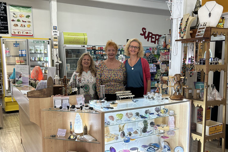 Shop owner Caroline Fisher (centre) with Louise and Daveena (surnames withheld). Picture: Supplied