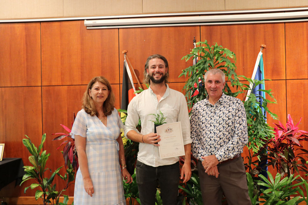 New Australian citizen Samuel Herridge, with Douglas Shire Deputy Mayor Lisa Scomazzon and Councillor Peter McKeown, at a citizenship ceremony in Port Douglas.