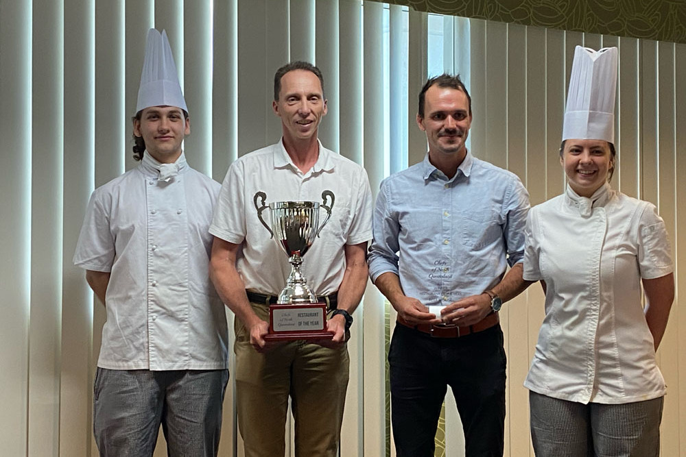 Award presenter and winner of the secondary school culinary challenge James Ryan, Reef House general manager Wayne Harris, Reef House head chef Ondrej Urbanovsky and winner of the secondary school culinary challenge Annika Reiha. Picture: Supplied