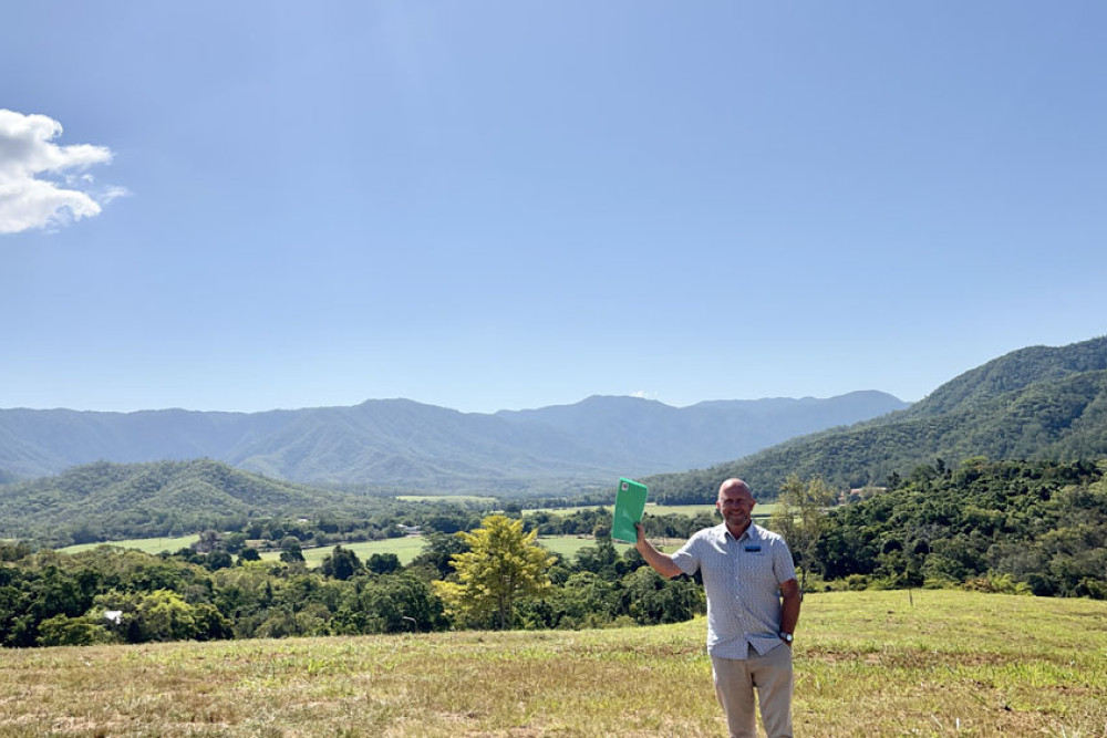 Property agent Brian Bolton at the acreage on sale at Goldsborough Valley.