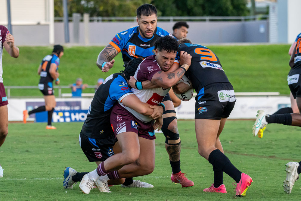 Nick Lui Toso and his teammates attempt to slow down the Bears. Picture: Emily Barker