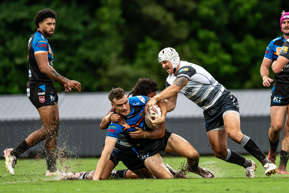 Zac Laybutt holds on tight in the Tweed Seagulls match. Picture: Emily Barker