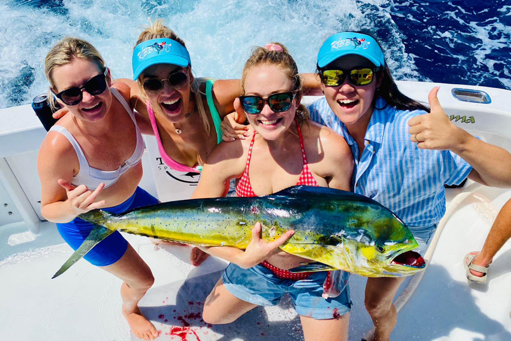 Team Allure made of Victoria Watson, Emma-Jean Sommer, Danielle Blayden and Rebecca Roberts with their mahi mahi catch at last year’s tournament. Pictures: Supplied