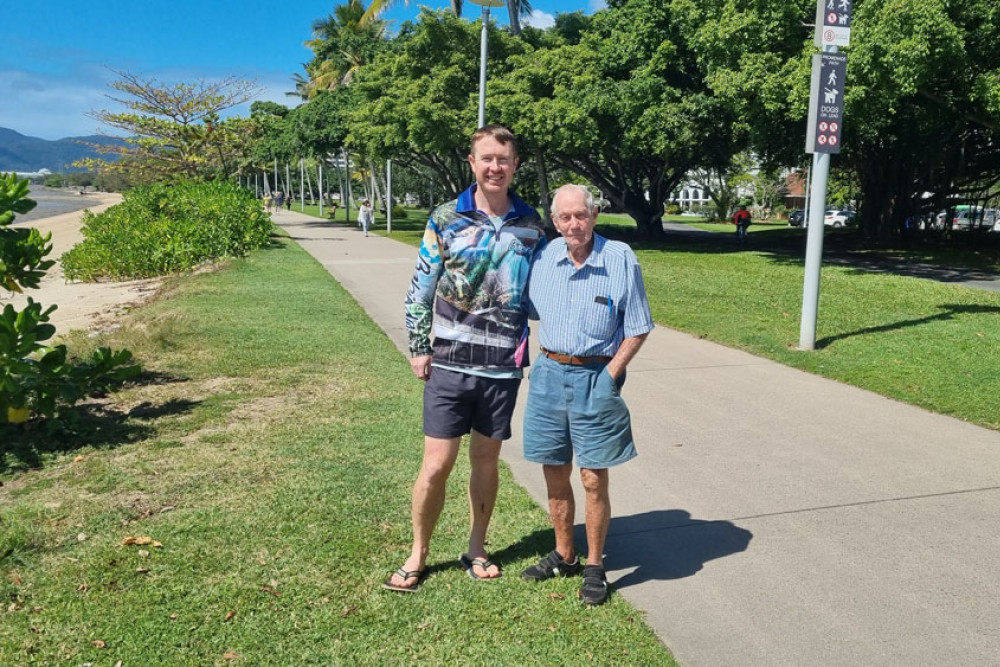 Dominic Sansom with his grandfather Bill Honeywell relaxing on the Cairns Esplanade after the Great Pyramid Race at Gordonvale. Main picture: Nick Dalton