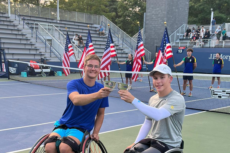 Cairns’ wheelchair tennis prodigy Ben Wenzel (right) with his doubles partner Ivar Van Rijt at the US Open where they took the 2024 boys’ wheelchair doubles championship.