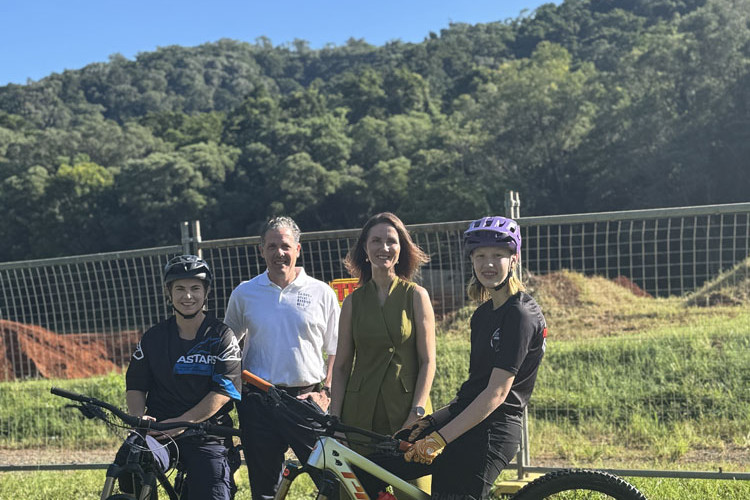 At the Crankworx ground (from left) world mountain bike champion Tracey Hannah, Tourism Tropical North Queensland CEO Mark Olsen, Cairns Mayor Amy Eden and Crankworx Cairns 2024 U15 downhill champion Kara Elepfandt. Picture: Supplied