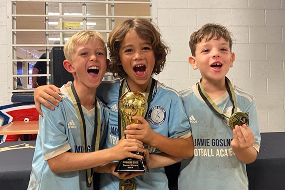 Members of the Jamie Gosling Football Academy U8s celebrate their win. Photos Supplied.