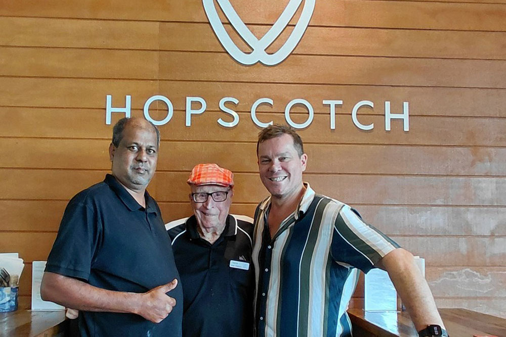 Legendary Hopscotch diner Fred Piercy (centre) with Parmod (Parmy) Kumar (left) Col Doody of the restaurant. Pictures: Supplied