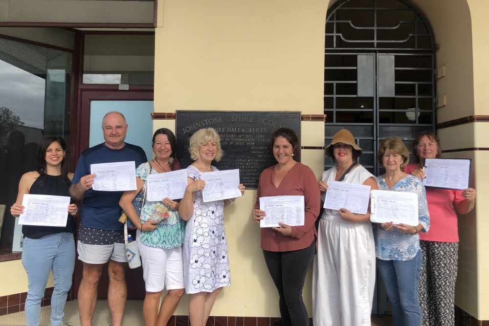 Some of the petitioners are (from left) Janelle Campbell, Neil Smith, Sharron Haddock, Dr Karen Benn, Tara Garozzo, Monique Young, Christine Nowell and Leonie Barra outside the Cassowary Coast Regional Council’s Innisfail headquarters. Picture: Supplied