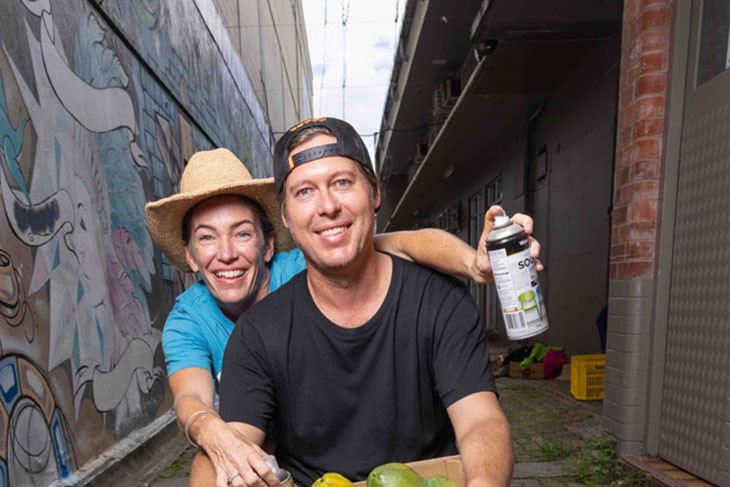 Candy MacLaughlin (left) of Skybury and Caddiend owner Oliver James united to host a competition for the most colourful papaya fruit boxes. Picture: Supplied
