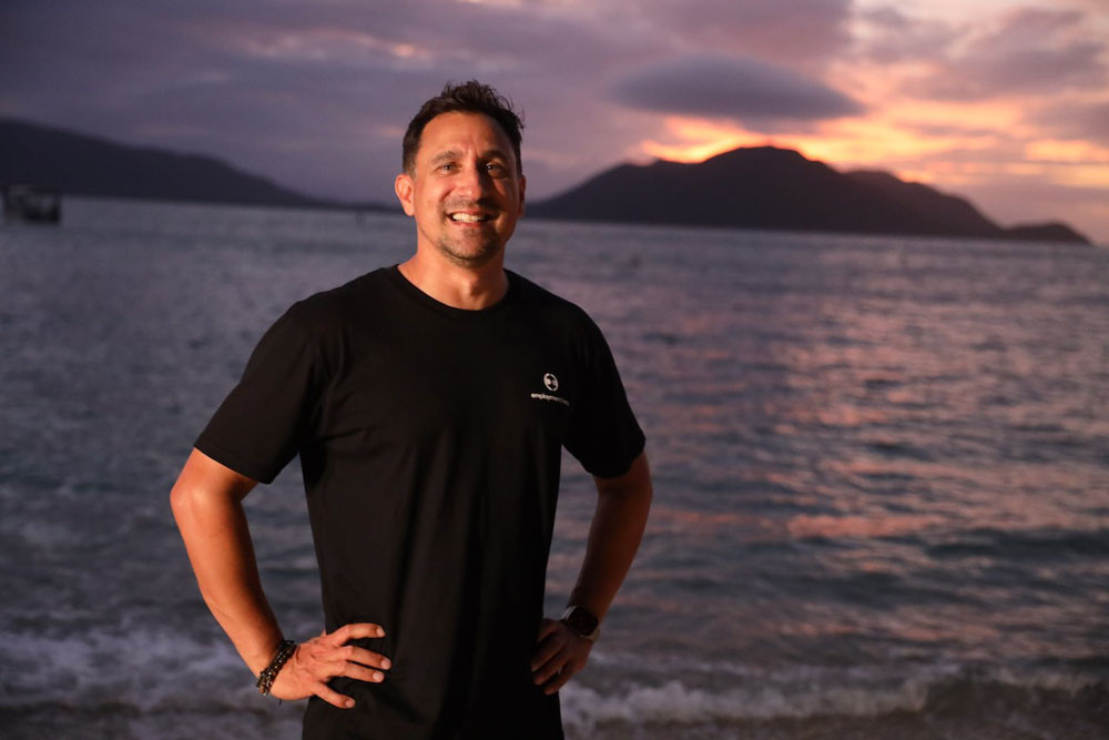 Employment Hero brand and creative head Matt Poulier checks out the sunset from Fitzroy Island. The firm is offering a sunset supervsior role to one lucky applicant. Picture: Employment Hero