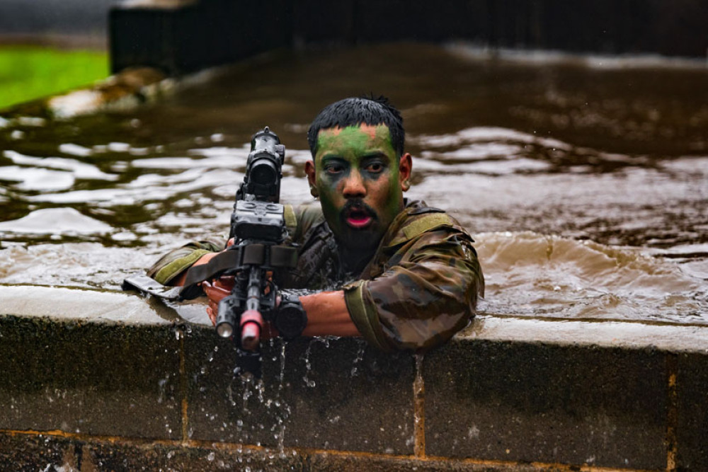 Soldiers from the Australian Army’s 5th/7th Battalion Royal Australian Regiment and French troops from the New Caledonian Armed Forces, conduct Exercise True Grit at Tully. Picture: Corporal Madhur Chitnis
