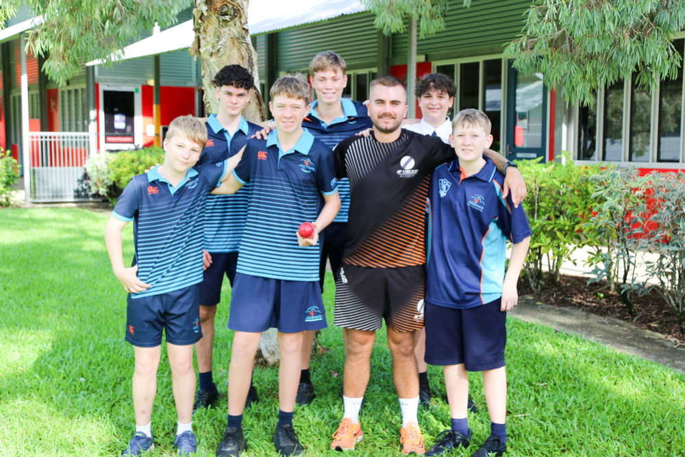 St Andrew’s high performance coach Andrew Phelps with Cricket Academy players, part of the award-winning program recognised nationally for its inclusive approach, elite coaching and strong community engagement. Picture: Supplied