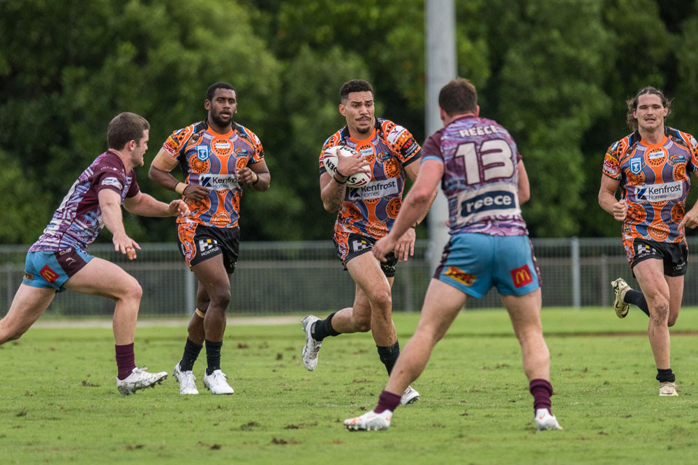 Winger Robert Derby in action against the Brisbane Tigers.