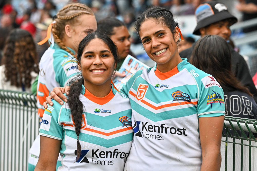 Jairel-Ellen Martin-Savage and Pride winger Kimberley Hunt share a moment with fans following a recent home match at Barlow Park. Picture: Emily Barker.