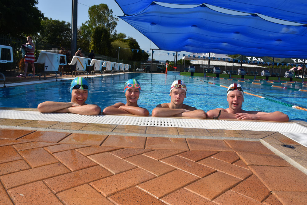 From left, Nathan Andronicus from Central Cairns Swimming club, Kiara Williams from Central Cairns Swimming, Callum Robertson from Saints Swimming Club, and Matthew Rowbotham from Saints Swimming Club. Picture: Isabella Guzman Gonzalez