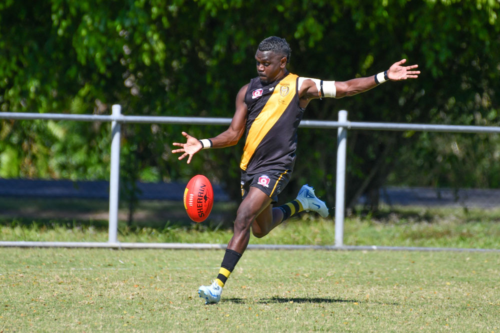 The Tigers will be hoping Fitzroy Greenwool (above) is fully fit for tomorrow’s sudden death preliminary final against an in-form Cairns City Lions. (Below, right) Lisa Fatnowna and the Cairns City Lions will be working hard against the Manunda Hawks tomorrow for a spot in the 2024 AFL women’s grand final. Pictures: RAWI/AFL