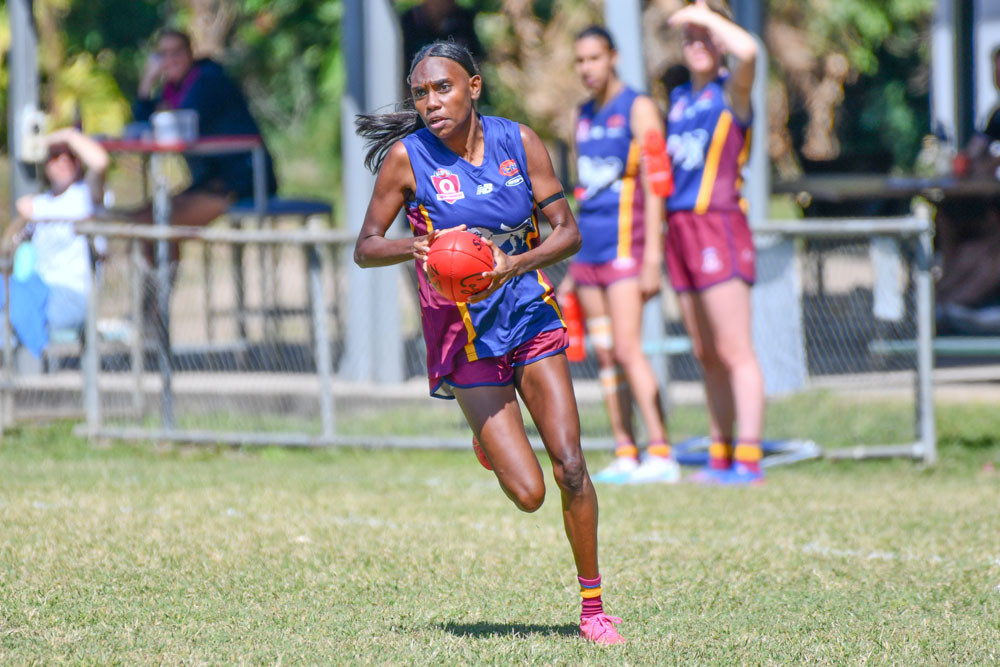 Delphina Day had a day out with a best on ground performance against the Saints. (Above right) Daysia Creed-Wray is consistently amongst the Lions best performers. (Below) Nelly Anu helped Cairns City Lions stay on top of the Cairns Saints at ITEC Group Oval. Pictures: RAWI/AFL