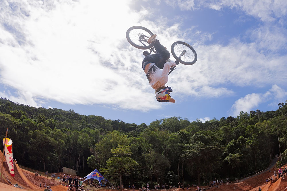 A Crankworx competitor does a flip on the Smithfield circuit. Picture: Clint Trahan