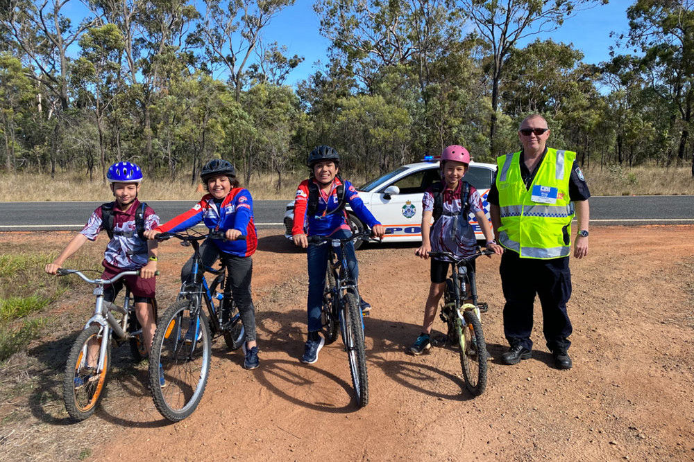 Youngsters with a police officer