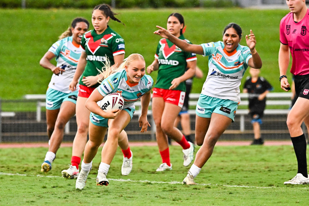 BMD Pride player Brandy Yallop races away to score during a historic first home game at Barlow Park. The team triumphed 20-14 over Wynnum Manly. Picture: Emily Barker