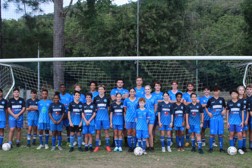 Stratford Dolphins senior and junior players at their football ground. Below (from clockwise) premier men’s coach Rob Wales and premier women’s coach Martin Fehlberg, the 1972 Stratford Dolphins Crad Evans Shield winning side, and the mighty Stratford side of 1975 went through the season undefeated, knocking up double digit scores.