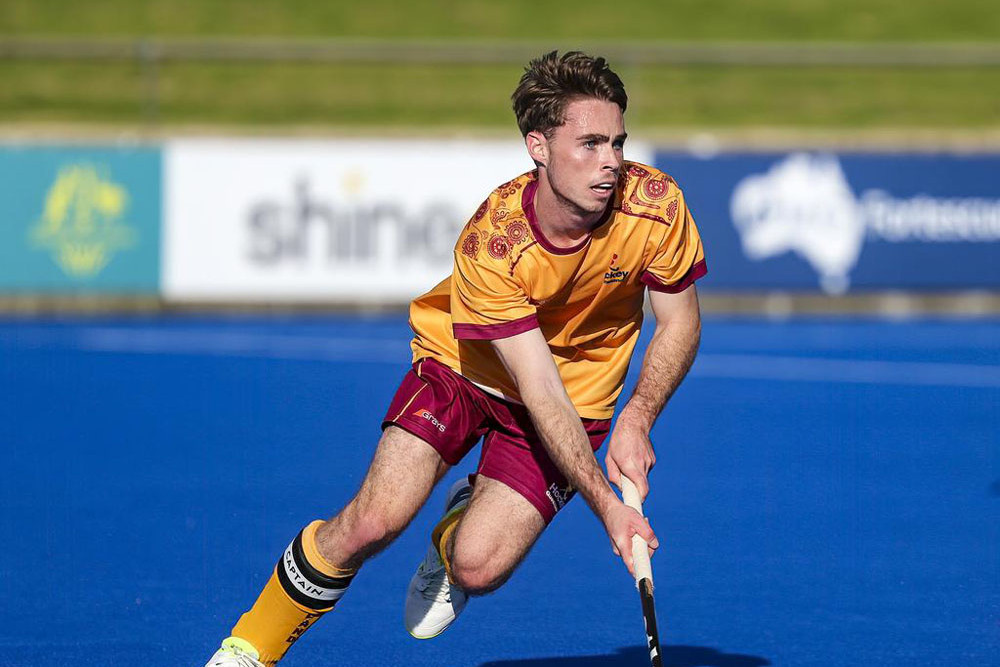 ookie of the year Jayden Atkinson in action for Queensland. He is aiming for the next Olympics. Picture: Hockey Queensland