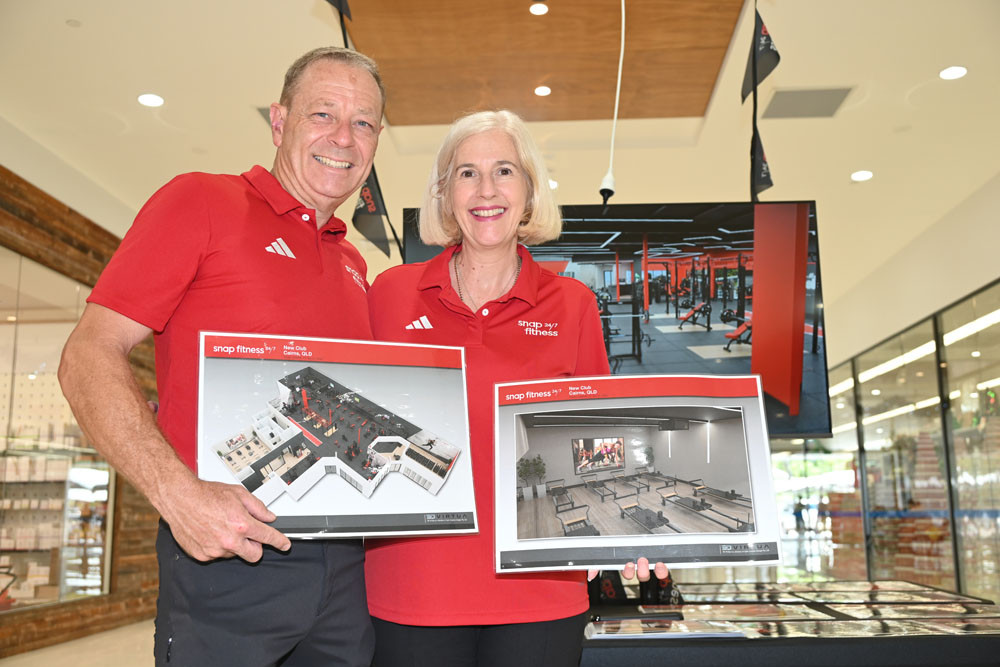 Franchisees Nathan and Angie Daley show the 3D floor plan of the first Snap Fitness gym coming to Raintrees shopping centre in early 2025. Picture: Isabella Guzman Gonzalez