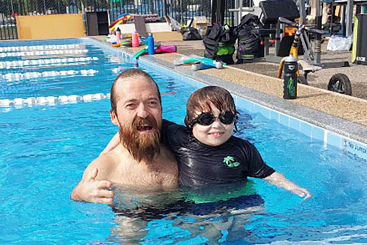 Grant ‘Scooter’ Patterson with Finn Thistlewhaite, 6, at the swim day. Picture: Supplied