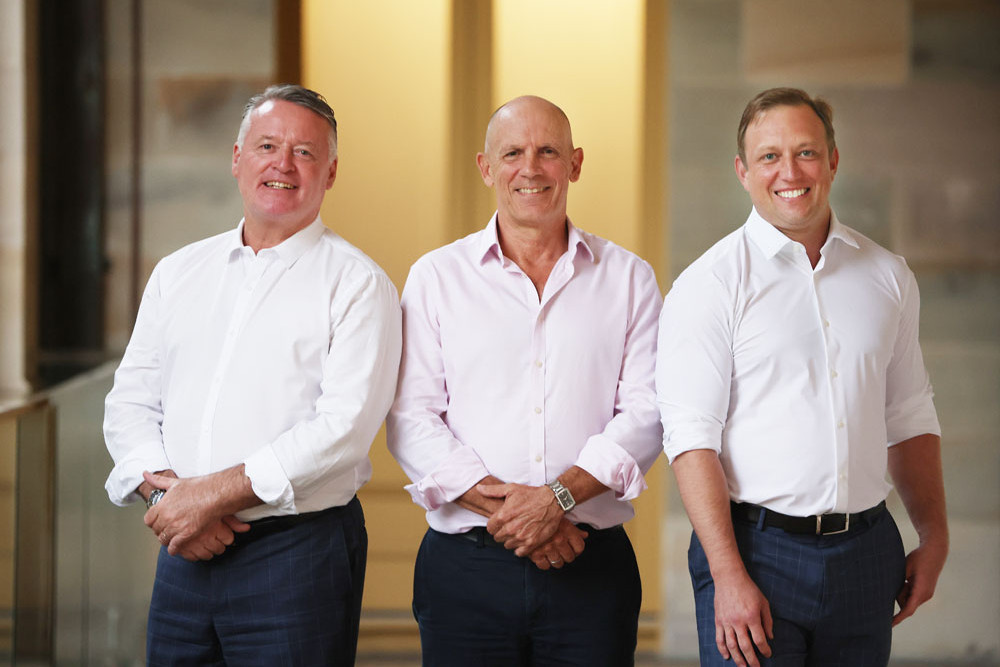 Labor’s Mulgrave candidate Richie Bates (centre) with Cairns MP Michael Healy (left) and Premier Steven Miles. Picture: Supplied