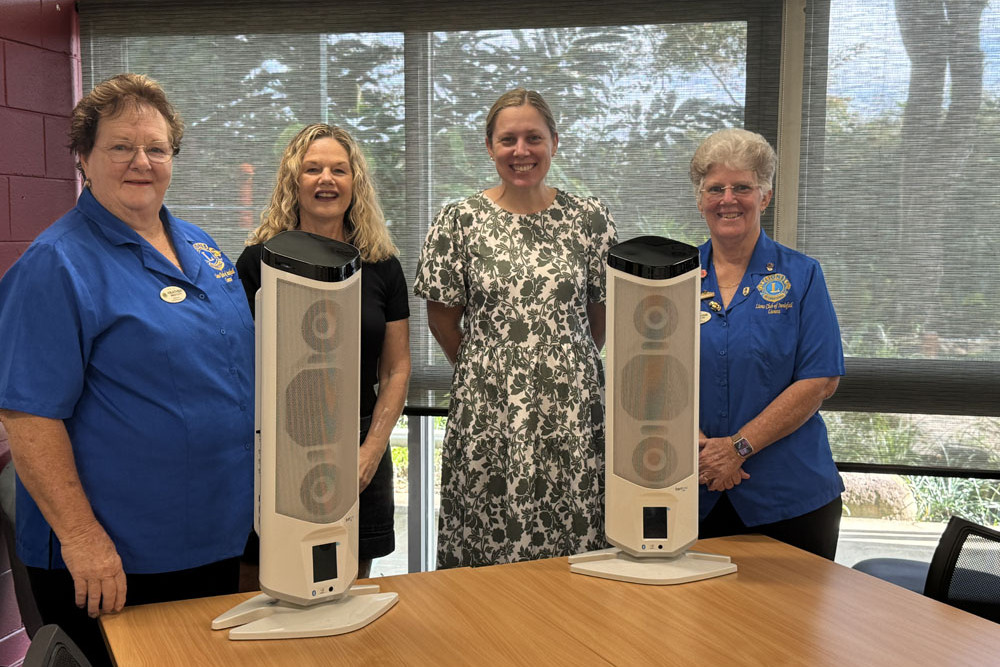 Innisfail Lions Club member Heather Westcott (left), Innisfail State School deputy principal Cathy Amos, school principal Jemma McClafferty and Lions club president Christine Pascoe with the speakers. Picture: Supplied