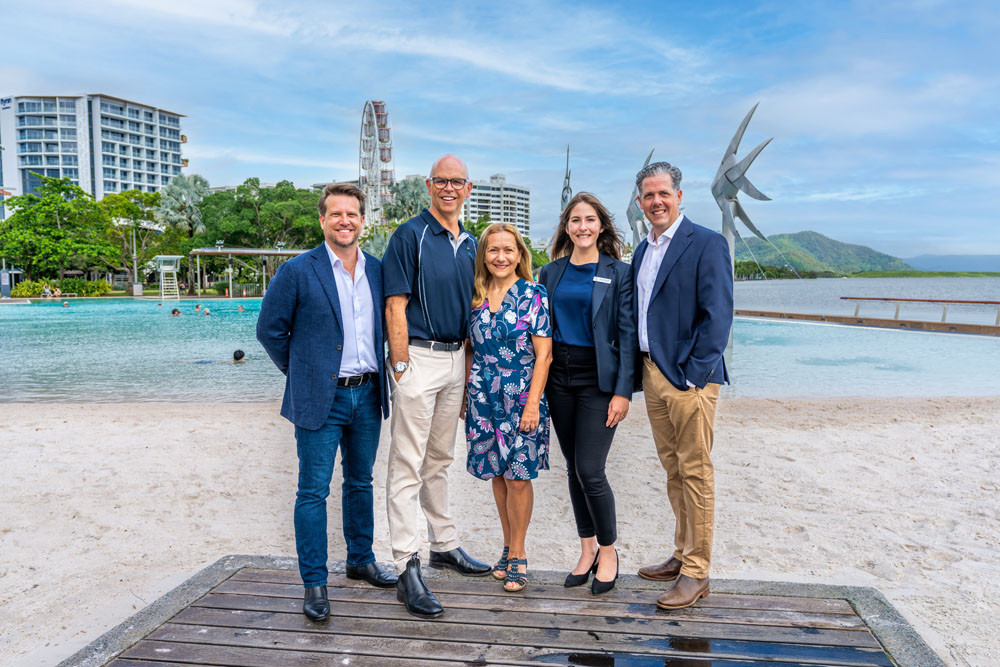 Tourism and Events Queensland (TEQ)’s Ollie Philpot (left), Cairns Airport CEO Richard Barker, CAPA Centre for Aviation events director Claudia Kunz, Cairns Convention Centre marketing manager Melissa Belevski and Tourism Tropical North Queensland (TTNQ) CEO Mark Olsen celebrate Cairns hosting the 2025 CAPA Airline Leader Summit Australia Pacific. Picture: Cairns Airport