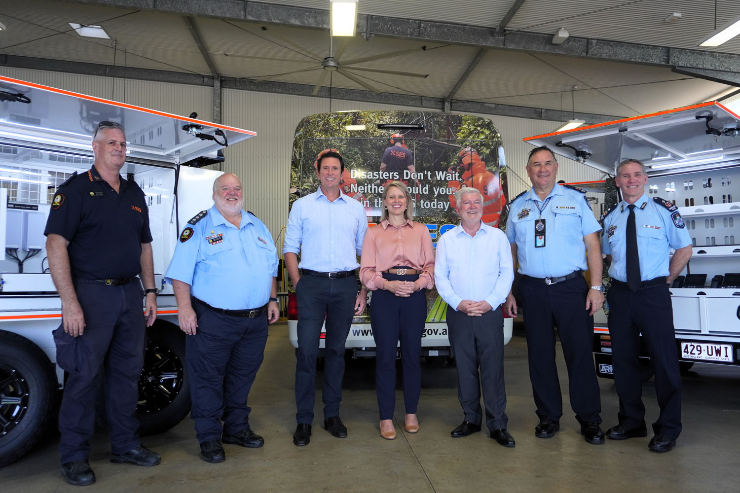 Police Minister Dan Purdie (third from left) with Barron River MP Bree James and Mulgrave MP Terry James (centre), police and SES officials unveil the two new Airbridge Resilient Network Infrastructure trailers. Picture: Hugh Bohane