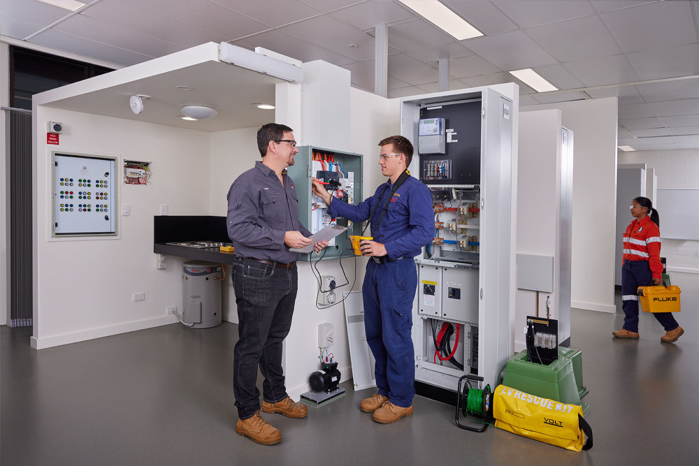 TAFE Queensland teacher Brad Godkin and electrical apprentice Liam McClarty