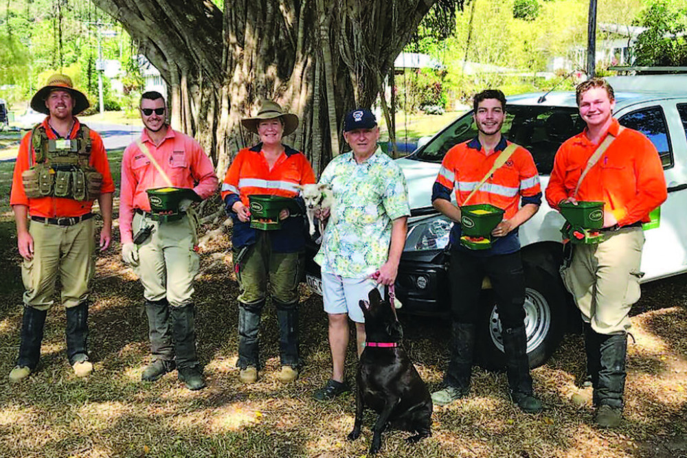 Malcolm (fourth from left) is pictured above with electric ant field team members Julian, Sam, Sharon, Lachlan and Josh who were applying the second round of treatment to the infested area