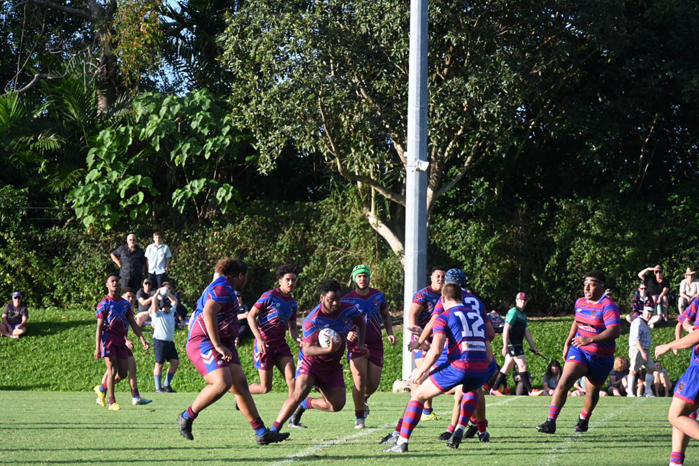 A Mareeba State High School player charges towards St Augustine’s College defence. Picture: Maddy Gavin