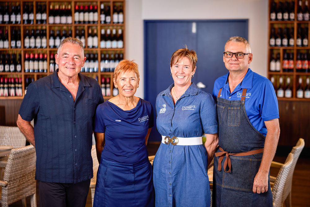 Former Dundee’s owner Gary Low (left), long-time staff member Marion Wright, general manager Tina Wort and executive chef James Wort reflect on the legacy of Dundee’s at the Cairns Aquarium, which will close on Sunday. Picture: Supplied