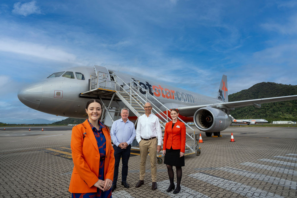 Jetstar crew members Toni Fields and Britt Maxwell with Queensland Tourism Minister Michael Healy and Cairns Airport chief executive officer Richard Barker announcing the historic new service between Christchurch and Cairns. Picture: Cairns Airport