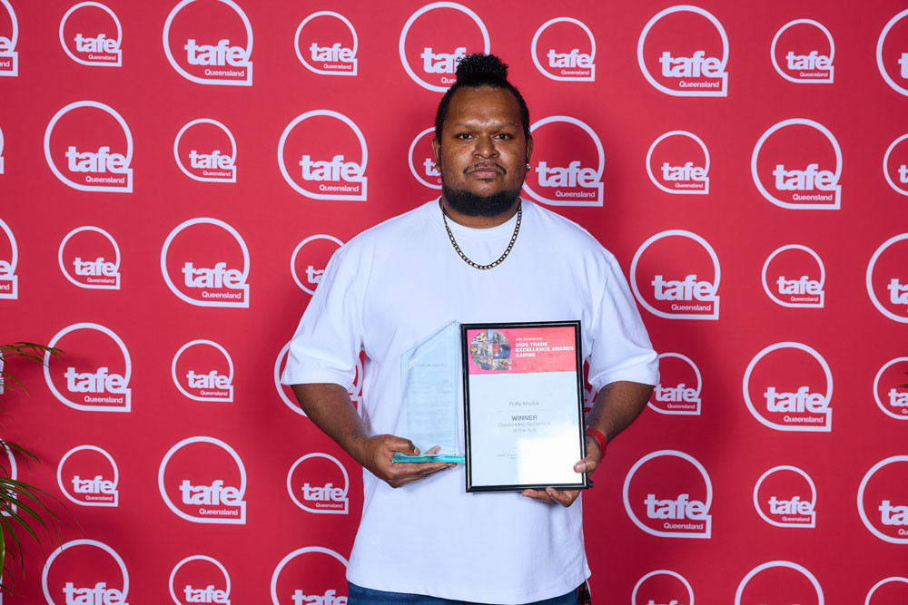 TAFE cookery and outstanding apprentice of the year Phillip Mooka is delighted to take out the top awards. Picture: TAFE Queensland