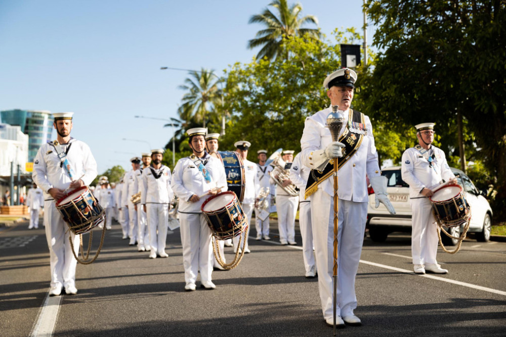The Royal Australian Navy Band prepare to march through the city of Cairns during a Freedom of Entry March. Image by ABIS Susan Mossop