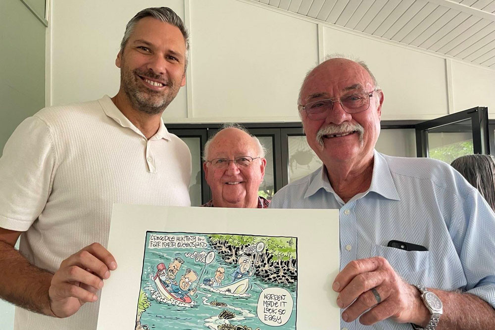 Retired Member for Leichhardt Warren Entsch (right) presented his predecessor Matt Smith (left) with the last cartoon of Mr Entsch and the first of Mr Smith while Cairns Museum and History Society president Clive Skarott looks on. Picture: Facebook