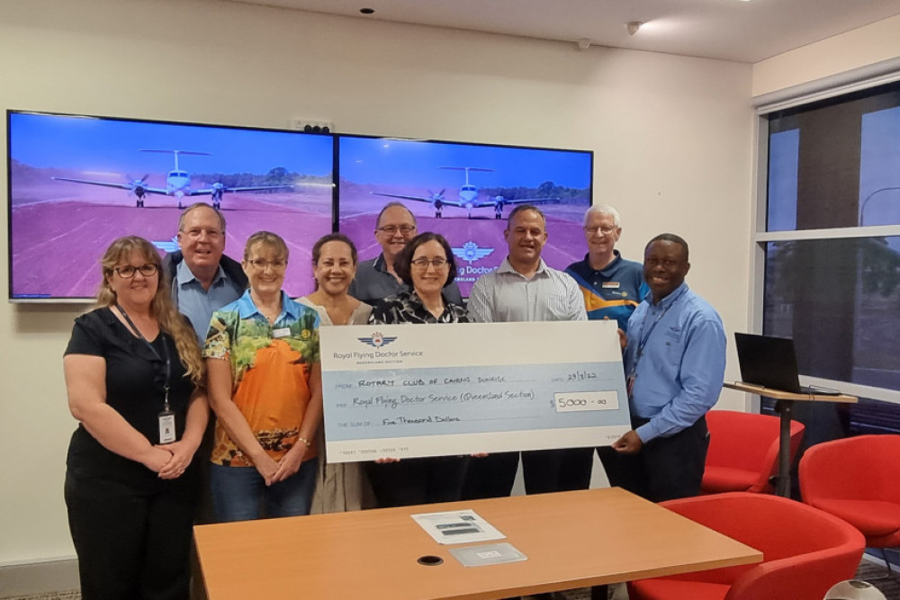 Rotary Cairns Presents cheque to RFDS